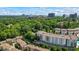 Aerial view of community surrounded by green trees, offering a beautiful skyline in the background at 291 Goodson Nw Way, Atlanta, GA 30309