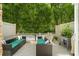 Outdoor deck with lounge seating, greenery, and a peaceful setting at 291 Goodson Nw Way, Atlanta, GA 30309