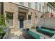 Backyard featuring outdoor seating, brick accents, and well-maintained landscaping at 291 Goodson Nw Way, Atlanta, GA 30309