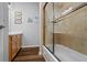 Bright bathroom features a tiled shower-tub and wood-look floors at 291 Goodson Nw Way, Atlanta, GA 30309