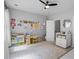 Cozy bedroom featuring carpet, a ceiling fan, and playful decor at 291 Goodson Nw Way, Atlanta, GA 30309