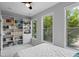 Light-filled bedroom features built-in shelving and two large windows at 291 Goodson Nw Way, Atlanta, GA 30309