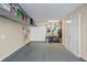 Organized garage with ample storage, shelving, and work area, featuring a clean, neutral aesthetic at 291 Goodson Nw Way, Atlanta, GA 30309