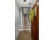 Entryway with wood-look flooring, stairs to the second level, and wood-trimmed doorway at 291 Goodson Nw Way, Atlanta, GA 30309