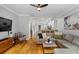 Spacious living area with an open layout, connecting to the kitchen and dining room at 291 Goodson Nw Way, Atlanta, GA 30309