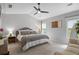 Spacious main bedroom with neutral tones, recessed lights, and multiple windows at 291 Goodson Nw Way, Atlanta, GA 30309