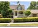 Charming home with a welcoming front porch, manicured lawn, and inviting curb appeal at 4530 Upland Court, Cumming, GA 30040