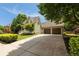 Charming home with a long driveway and attached two car garage at 4530 Upland Court, Cumming, GA 30040