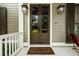 Charming front door entrance with sidelights and a 'Welcome' mat at 4530 Upland Court, Cumming, GA 30040