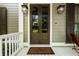 Cozy front porch featuring a welcoming 'Welcome' mat at 4530 Upland Court, Cumming, GA 30040