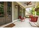 Welcoming front porch with a ceiling fan and a swing at 4530 Upland Court, Cumming, GA 30040