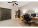 Office space with a desk, chair, computers, and a closet for storage at 4530 Upland Court, Cumming, GA 30040