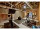 Home workout room with exercise bike and inversion table, offering an accessible exercise area at 4530 Upland Court, Cumming, GA 30040