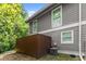 Exterior view of the back of the house with fenced in utility space at 5040 Meadow Lane Ne, Marietta, GA 30068