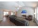 Cozy living room with a fireplace, hardwood flooring and an open layout into the dining area at 686 Stark St, Lawrenceville, GA 30046