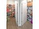 Walk-in pantry showcasing generous storage with organized shelves and double doors for access at 686 Stark St, Lawrenceville, GA 30046