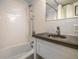 Bathroom featuring a modern tub with subway tile surround and rainfall shower head at 130 26Th Nw St # 701, Atlanta, GA 30309
