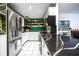 Bright kitchen featuring white cabinets, stainless steel appliances, and a stunning countertop at 130 26Th Nw St # 701, Atlanta, GA 30309