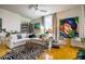 Bright living room featuring a cozy couch, modern decor, and stylish accents at 130 26Th Nw St # 701, Atlanta, GA 30309