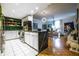 Open-concept living space featuring a stylish kitchen, dining area, and a well-lit living room at 130 26Th Nw St # 701, Atlanta, GA 30309