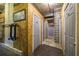 Hallway with storage units, each with a numbered door at 130 26Th Nw St # 701, Atlanta, GA 30309