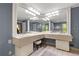 Bright bathroom with a spacious vanity area and large mirrors at 1533 High Haven Ne Ct, Atlanta, GA 30329