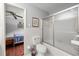 Bathroom features a toilet, shower with glass doors, and a view to the bedroom at 1533 High Haven Ne Ct, Atlanta, GA 30329