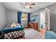 Inviting bedroom with a dresser and a large window at 1533 High Haven Ne Ct, Atlanta, GA 30329