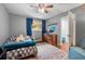 Cozy bedroom with a comfortable bed, colorful rug, and a dresser, creating a relaxing space at 1533 High Haven Ne Ct, Atlanta, GA 30329