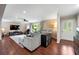 Open-concept living room boasting hardwood floors and a sliding glass door at 1533 High Haven Ne Ct, Atlanta, GA 30329