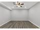Finished basement area with new flooring, recessed lighting, and neutral-toned walls at 2599 Willow Creek Dr, Duluth, GA 30096