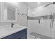 Modern bathroom featuring a glass shower, stylish vanity, and updated fixtures at 2599 Willow Creek Dr, Duluth, GA 30096