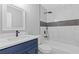 Modern bathroom with tub, glass shower, vanity, and stylish fixtures at 2599 Willow Creek Dr, Duluth, GA 30096