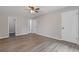Large bedroom with hardwood flooring, natural light, and ample closet space at 2599 Willow Creek Dr, Duluth, GA 30096