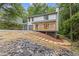 Charming two-story home featuring a welcoming porch and stylish gray and white exterior paint at 2599 Willow Creek Dr, Duluth, GA 30096