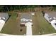Aerial view of a home with a fenced backyard, landscaping, and a shed at 272 Broadstone Blvd, Acworth, GA 30101
