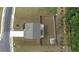 Aerial view of home showcasing fenced backyard, driveway, and landscaping at 272 Broadstone Blvd, Acworth, GA 30101