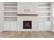 Elegant fireplace with stone surround and built-in shelving at 272 Broadstone Blvd, Acworth, GA 30101