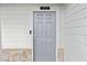 Stylish gray front door with modern hardware and sidelights, enhancing curb appeal at 272 Broadstone Blvd, Acworth, GA 30101