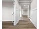 Open hallway features hardwood flooring and wainscoting at 272 Broadstone Blvd, Acworth, GA 30101