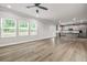 Spacious open-concept living room with hardwood floors and abundant natural light at 272 Broadstone Blvd, Acworth, GA 30101