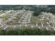 Aerial view of a new construction neighborhood featuring modern homes and well-manicured lawns at 272 Broadstone Blvd, Acworth, GA 30101