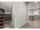 Convenient walk-in pantry with custom shelving for organized storage at 272 Broadstone Blvd, Acworth, GA 30101