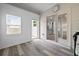 Bright sunroom with white wainscoting and access to the backyard at 272 Broadstone Blvd, Acworth, GA 30101