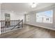 Upstairs landing area with hardwood floors and lots of natural light at 272 Broadstone Blvd, Acworth, GA 30101