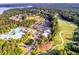 Aerial view of the community pool, golf course, and surrounding landscape at 414 Dogwood Way, Canton, GA 30114