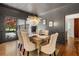 Bright dining room with elegant chandelier, hardwood floors, and traditional decor at 414 Dogwood Way, Canton, GA 30114