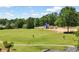 Community playground with open green space, perfect for outdoor activities and recreation at 414 Dogwood Way, Canton, GA 30114