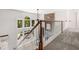 A staircase is leading to a bright open space with views of the backyard and stone accents at 414 Dogwood Way, Canton, GA 30114