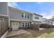 View of a townhome backyard featuring a patio and privacy fence at 1025 Cherryfield Run, Marietta, GA 30008